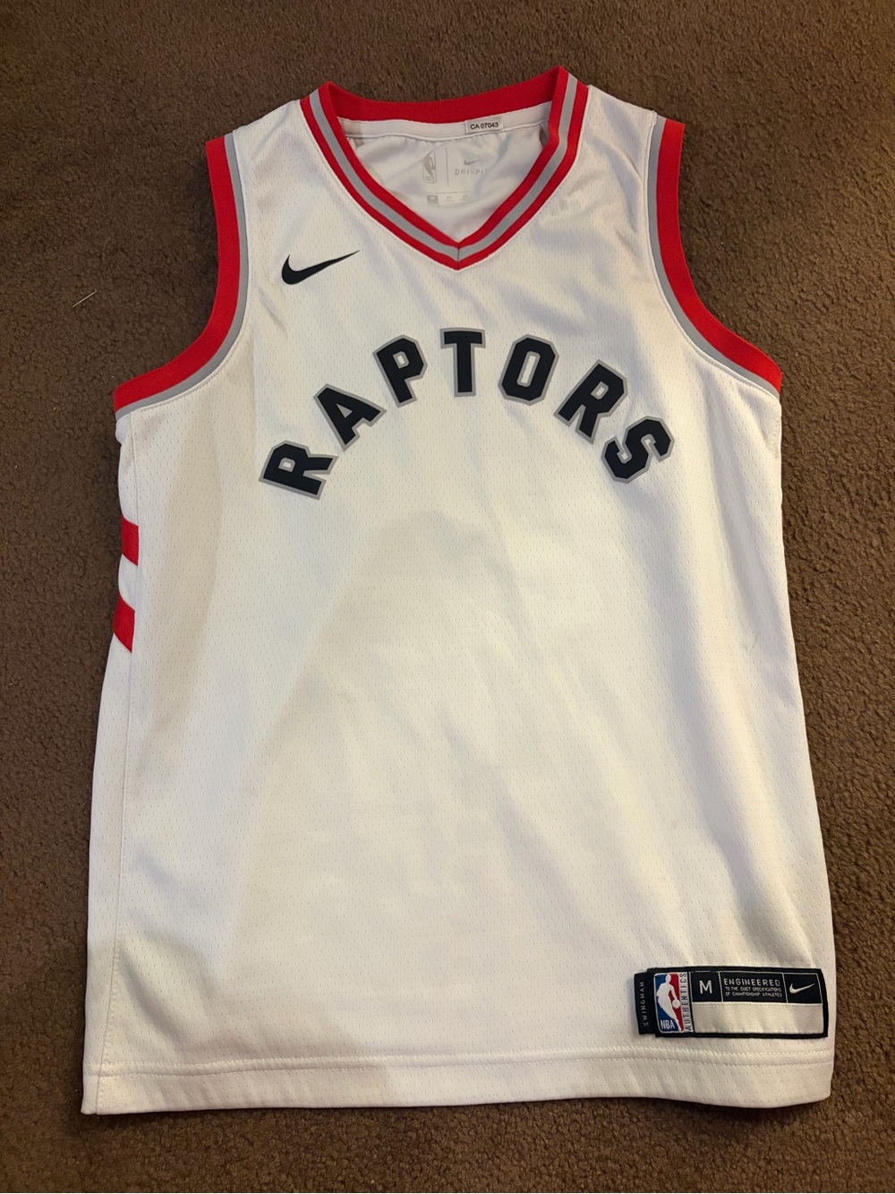 Nike White and Red Raptors Basketball Jersey